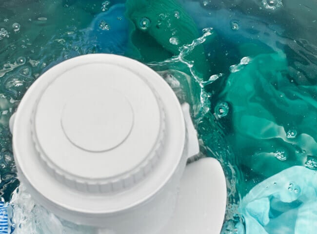 Amana® washer with clothes spinning